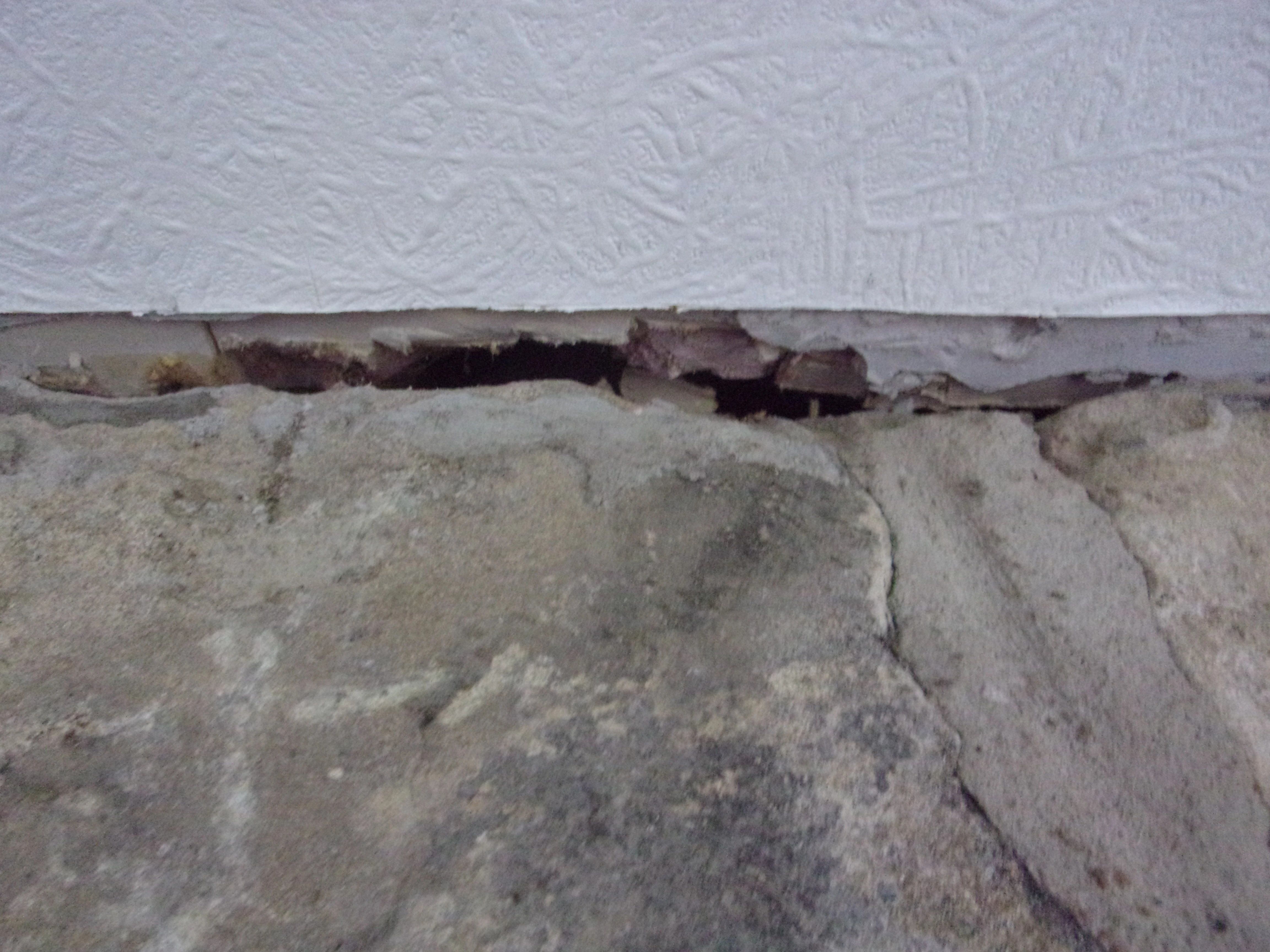 Wall to ceiling damage (1).webp