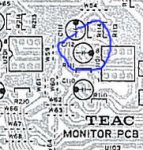 monitor pcb closeup capacitors w circle.jpg