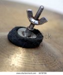 stock-photo-wingnut-securing-a-drum-cymbal-1678796.jpg